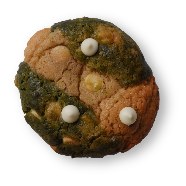 Photo of the product. It is a cookie with matcha and vanilla cookie marble effect. It is filled with white chocolate and as three chocolate chip on top. Looks pretty cool in my opinion.