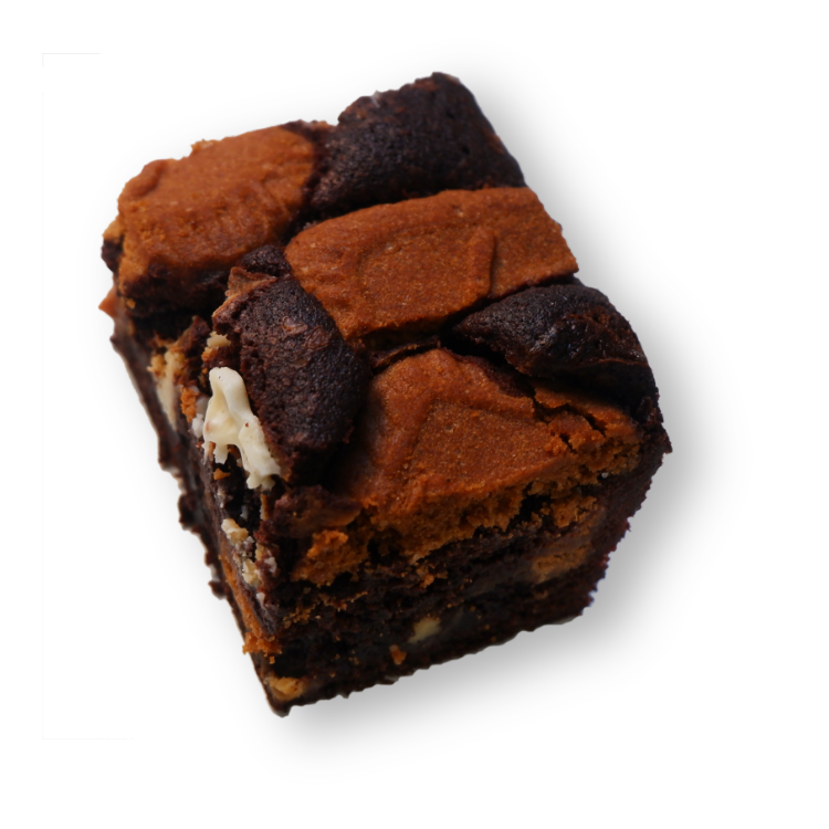 Photo of the product. It is a slice of the biscoff brownie with white chocolate.